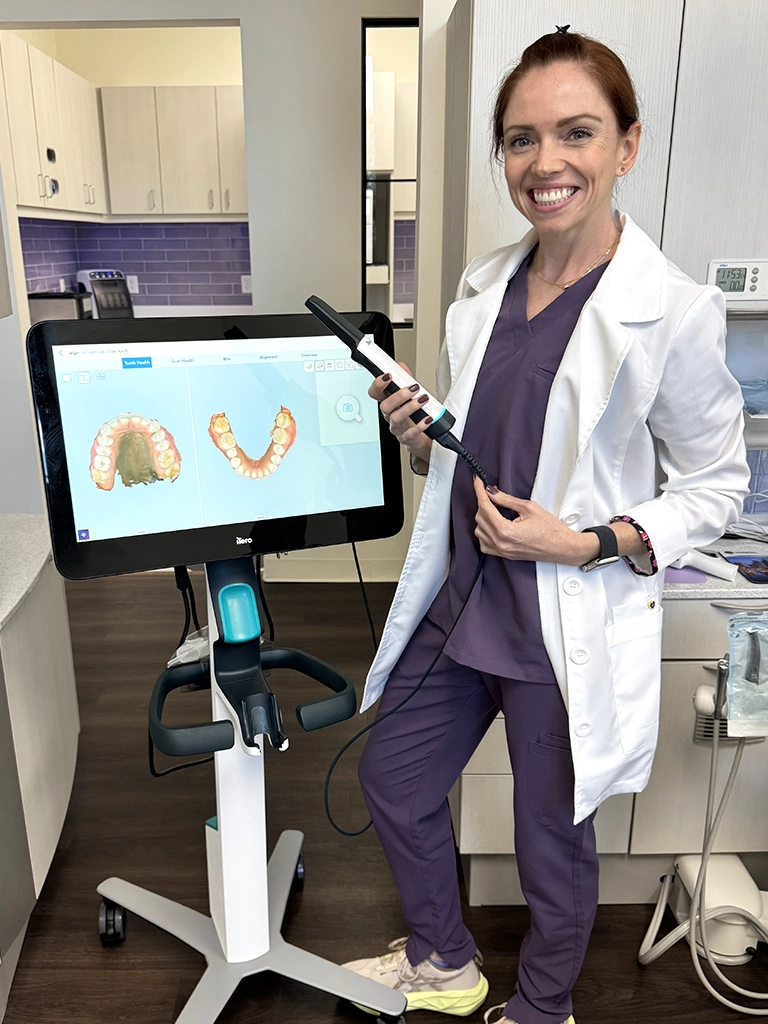 dr carolyn norton with iTero machine for dentistry